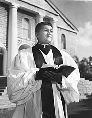 Reverend Akaka with Bible